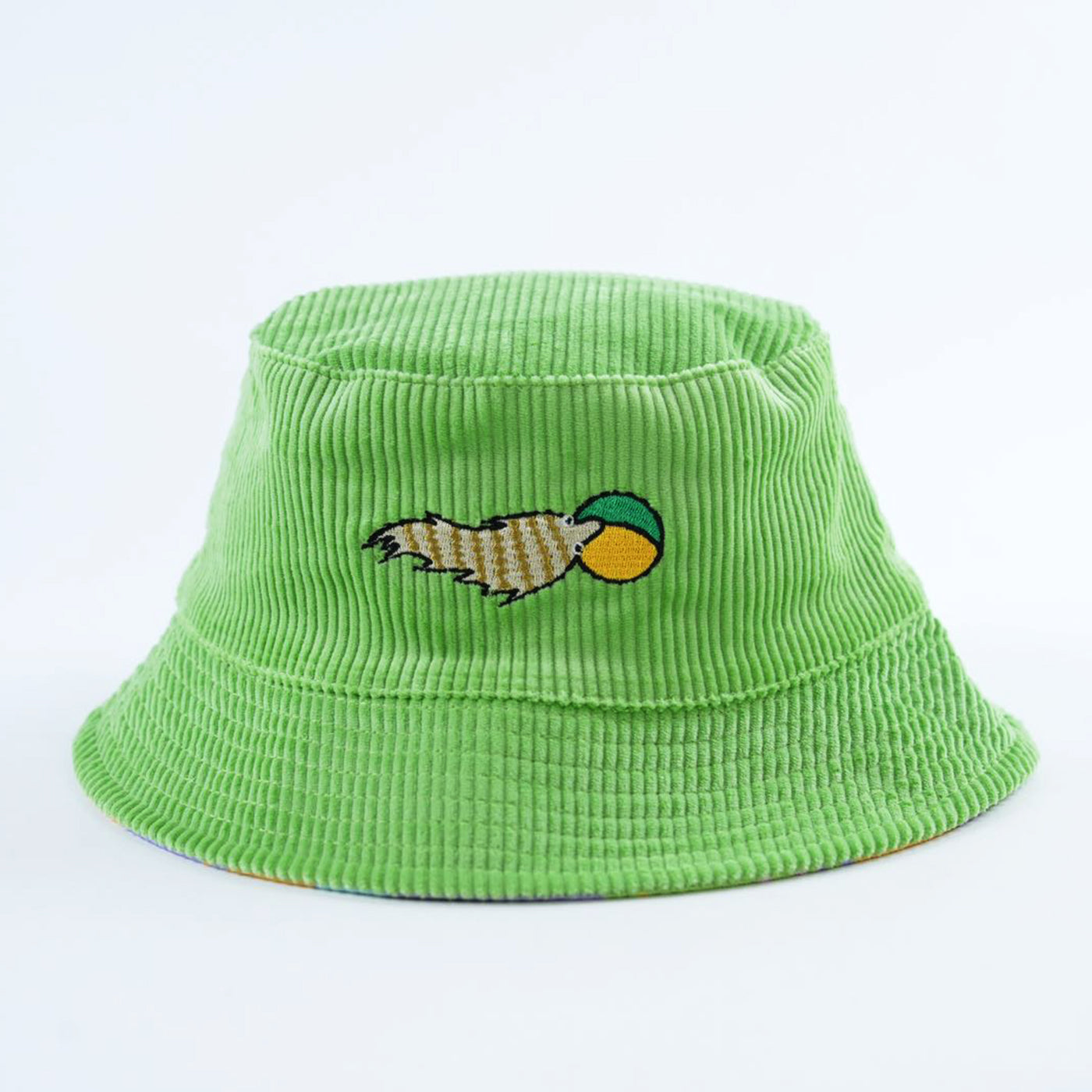 Green corduroy bucket hat with a sillly weasel embroidered design on a light gray background