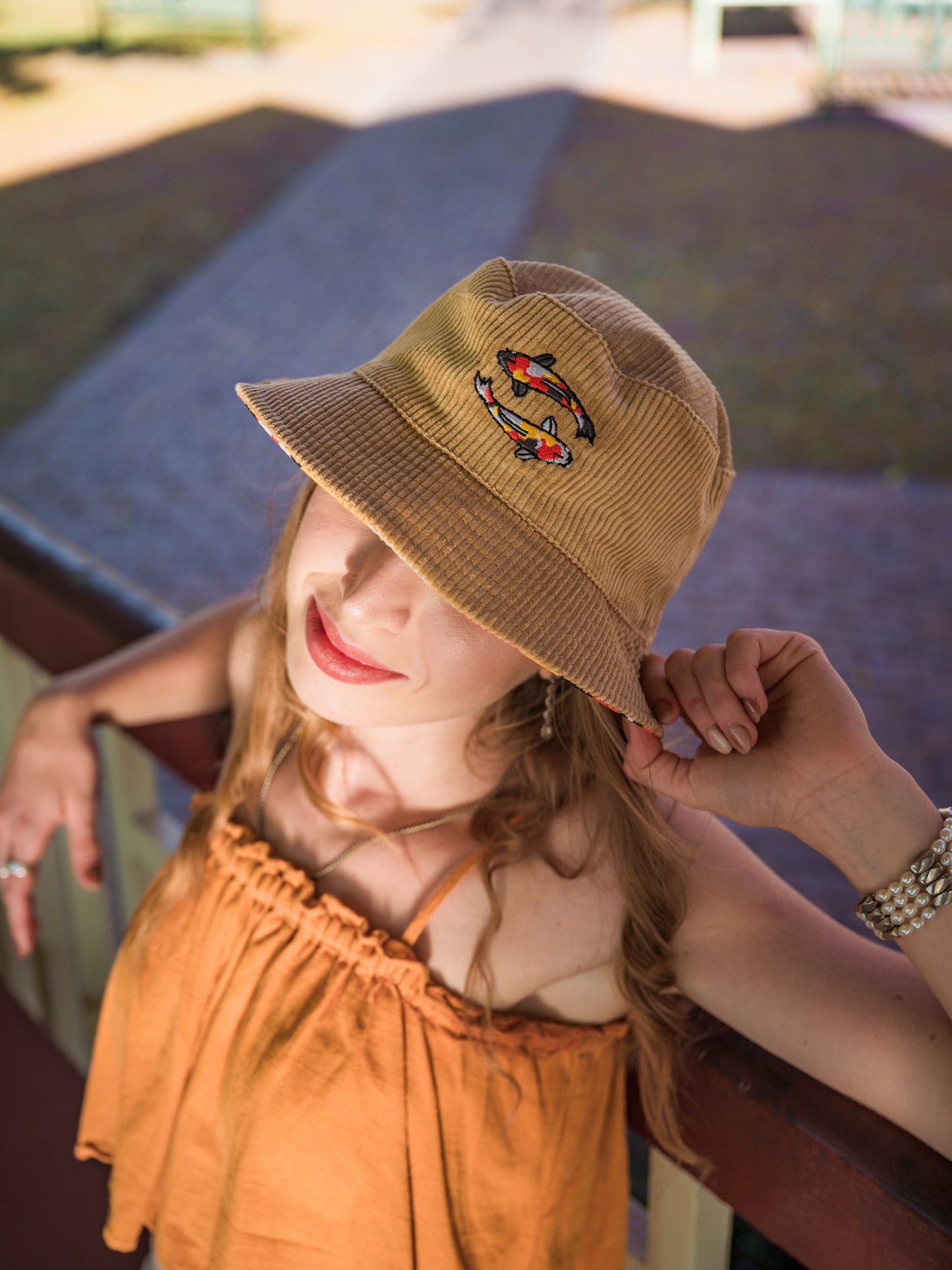 corduroy dual koi piscies bucket hat in tan